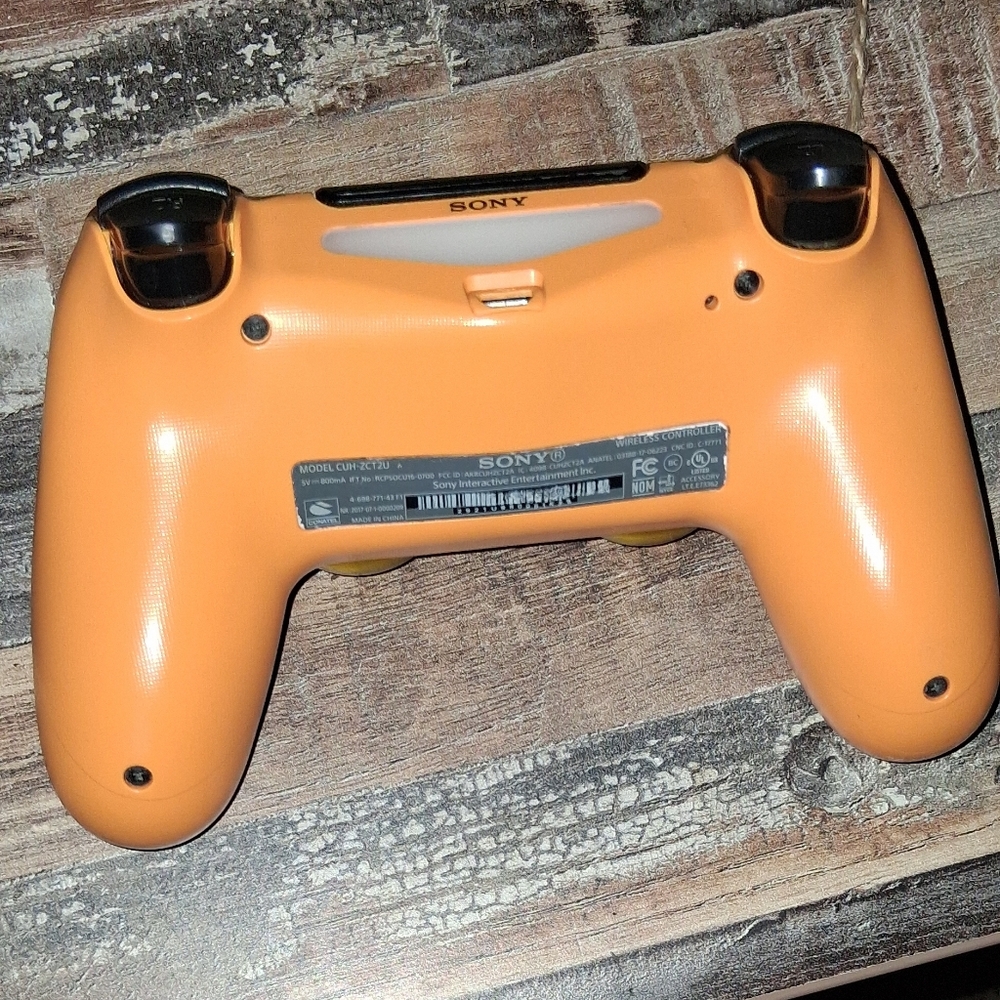 Sony Bright Orange Gaming Controller